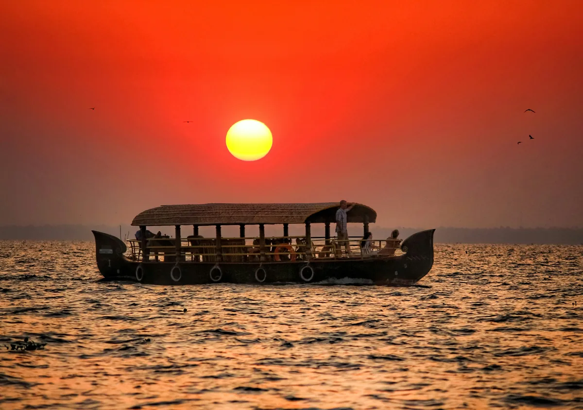 Illustrative sunset over a calm waterway